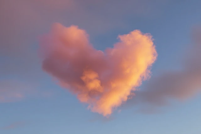 Heart Shaped Cloud in Sky Soft Lighting