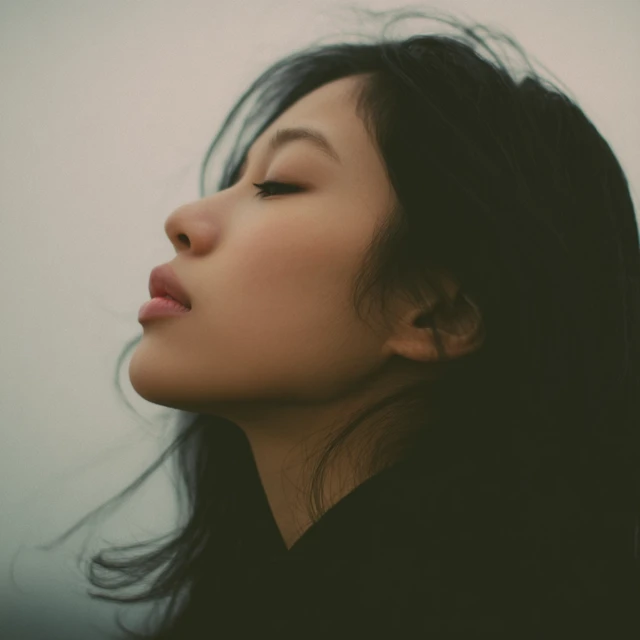 Asian Woman Portrait with Eyes Closed