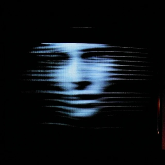 Abstract album art with a ghostly face