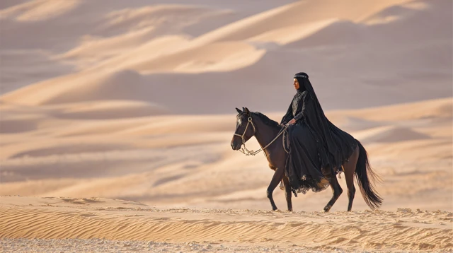 Saudi Woman on Horse in Desert