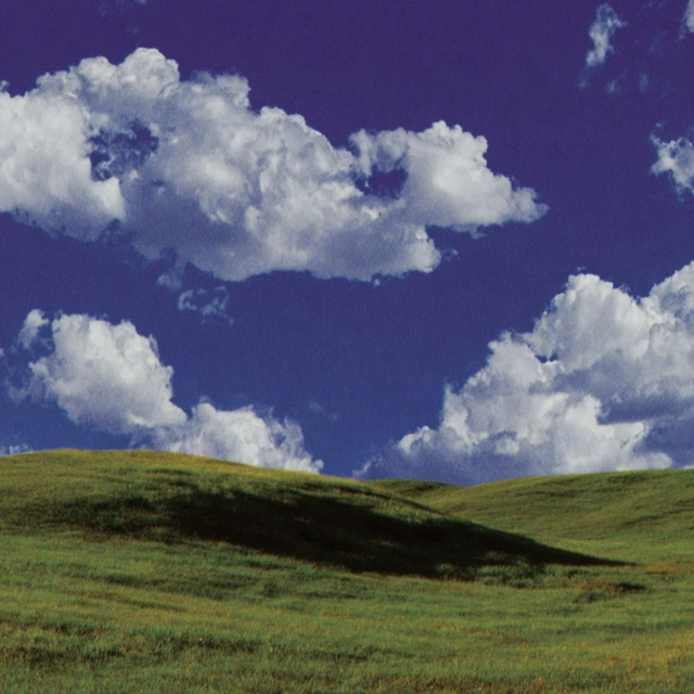 Windows XP Bliss Wallpaper Field and Clouds