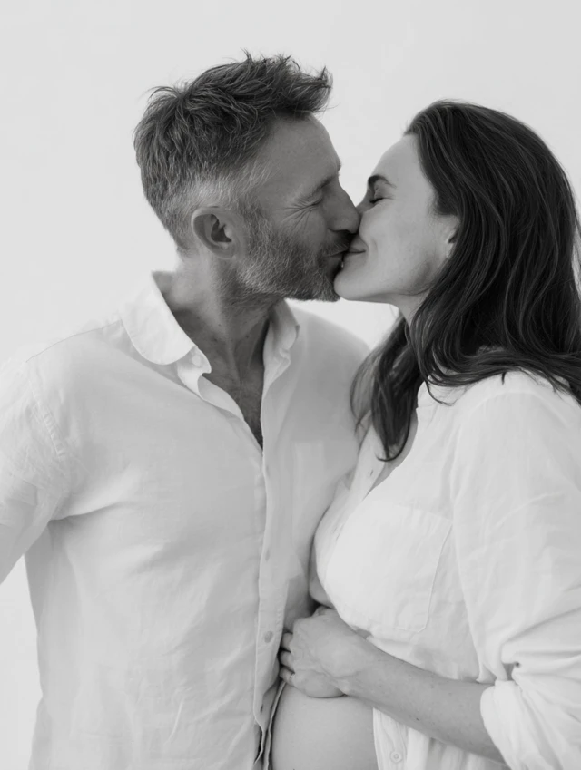 Romantic Pregnancy Photo Couple Kissing