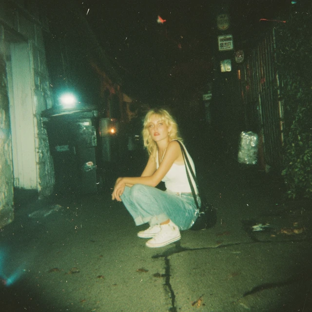 90s Blonde Woman In Alley Analog Photo