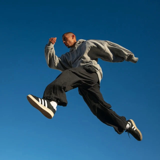 Streetwear Model Leaping in Air Fashion Photography