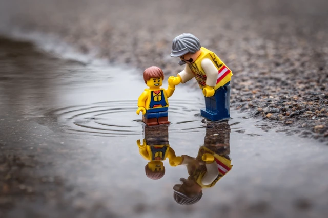 Lego Rescue Team Helping A Figure Photography