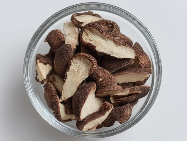 Shiitake Mushroom Slices in Glass Bowl High Resolution