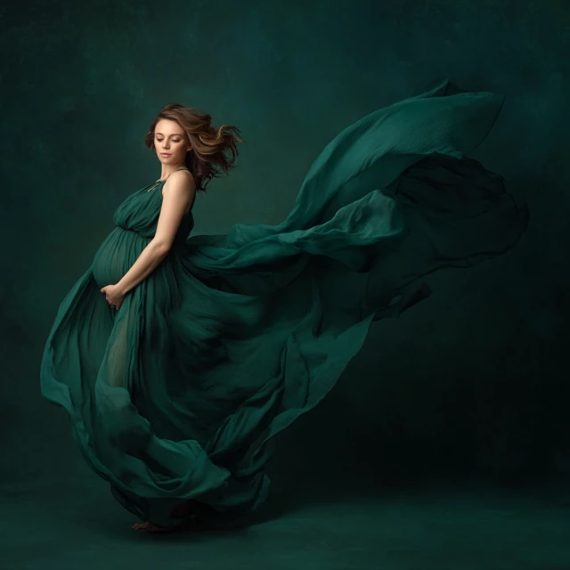 Maternity Portrait Green Dress and Flowing Fabric