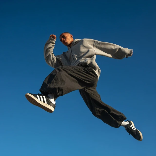 Streetwear Model Leaping in Air Fashion Photography