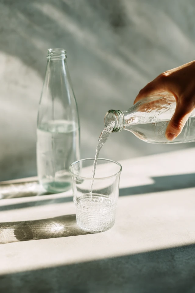 Pouring Water Glass Bottle Hand Refreshment