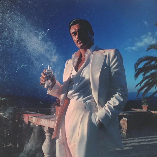 Suave Man in Summer Suit Perfume Ad
