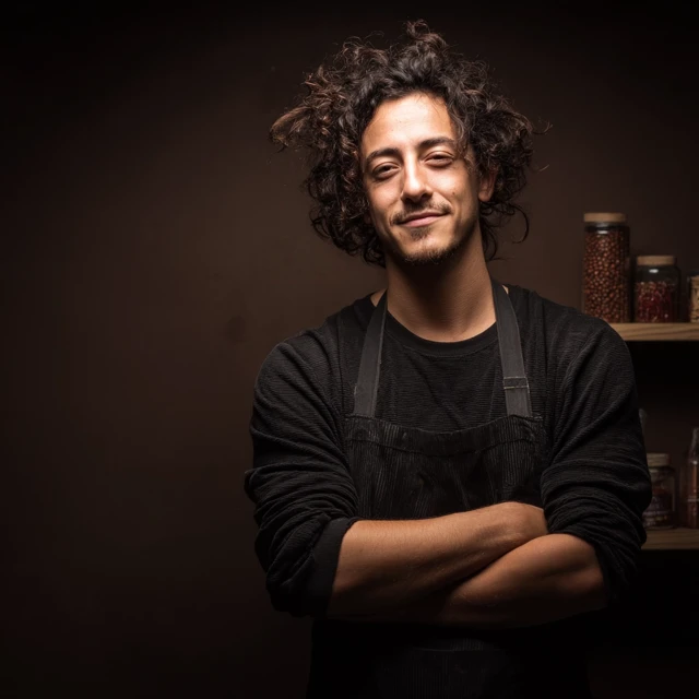 Thoughtful Barista Portrait with Coffee