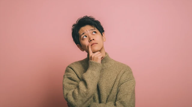Thoughtful Japanese Man Stock Photo Portrait