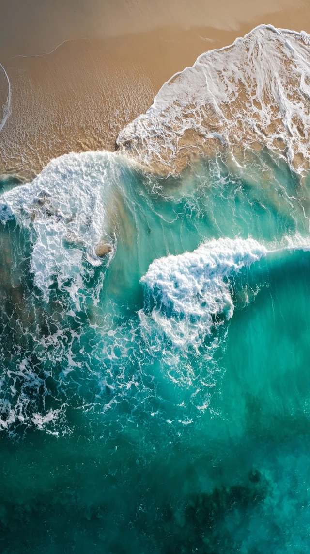 Ocean Waves Crashing on Shore Aerial View