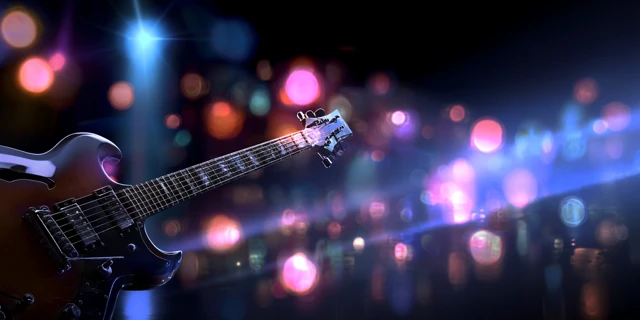 Hard Rock Stage with Bass Guitar and Colorful Lights