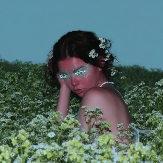 Bohemian Bridal Model with Flowers and Glitter Eyeshadow