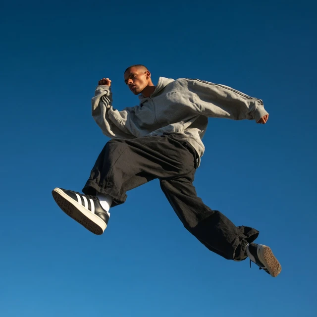 Streetwear Model Leaping in Air Fashion Photography