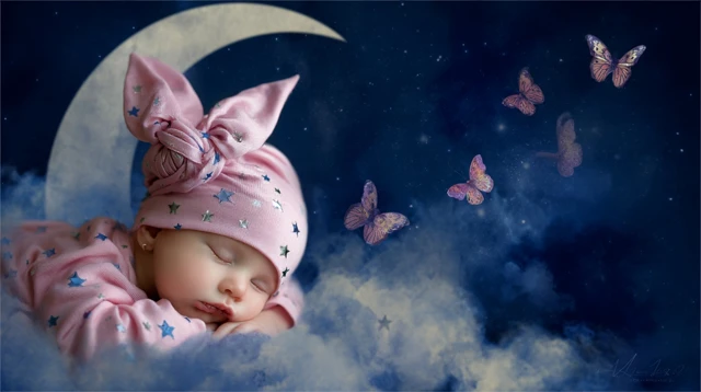 Sleeping Baby In Dreamland With Butterflies
