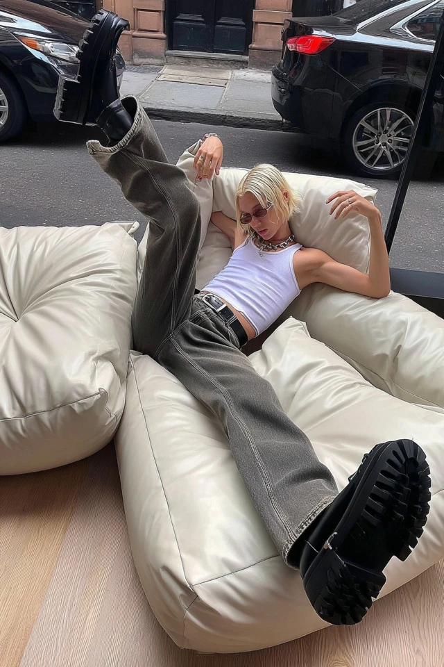 Cool Boy Relaxing in Oversized Jeans and Tank Top