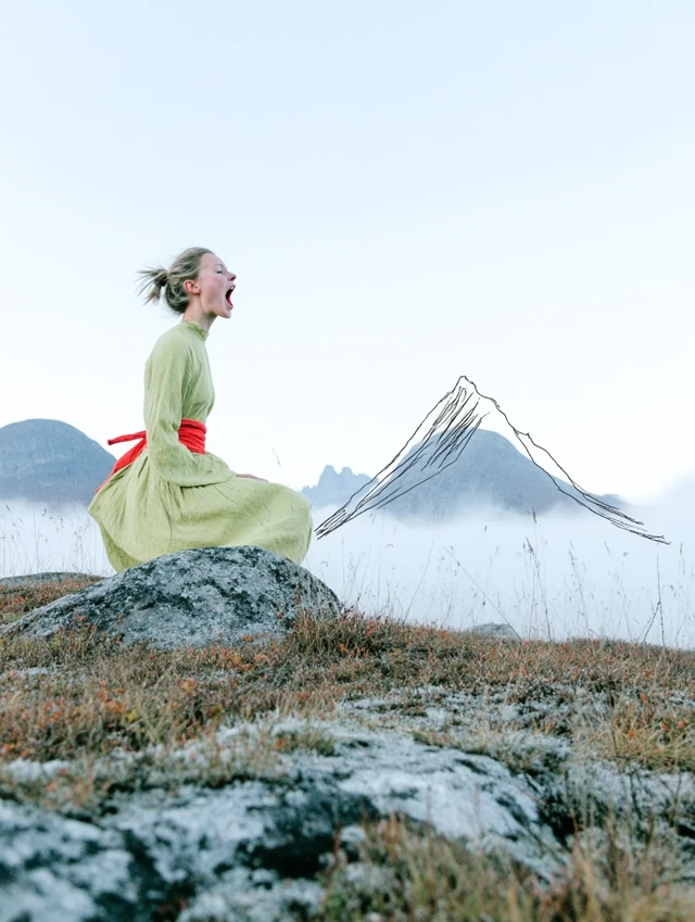 Woman Screaming in Mountains