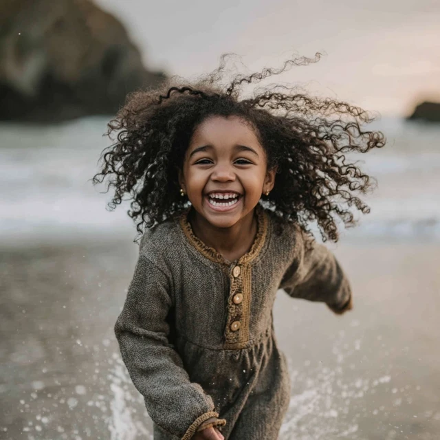 Girl Running on the Beach at Sunset