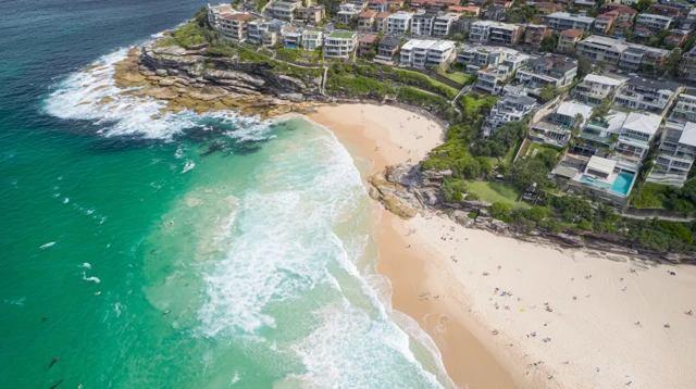 Coastal Beach Aerial View Turquoise Ocean and Lush Greenery