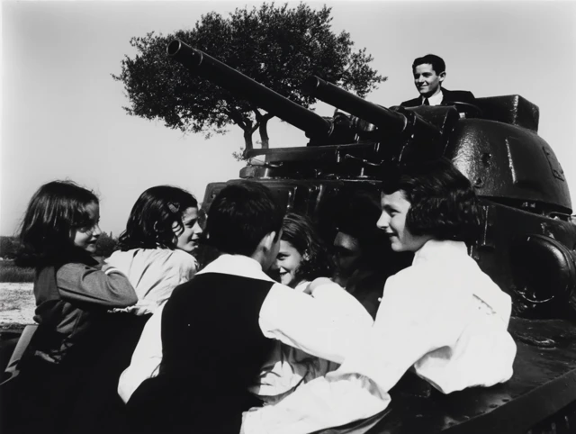 WWII Civilians Smiling Black and White Photo