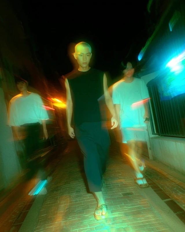 Tokyo Night Alley Scene with Man in Black