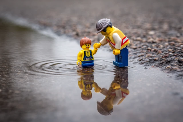 Lego Rescue Team Helping A Figure Photography