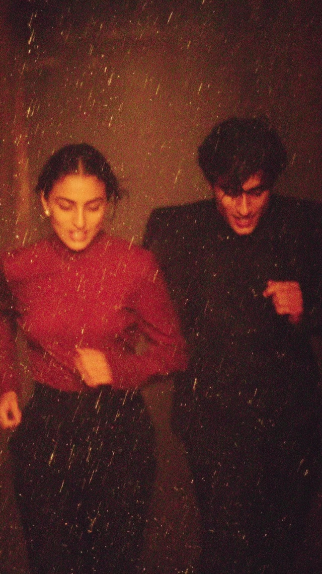 Couple in Rain Romantic Moment Dramatic Lighting