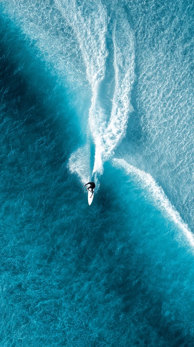 Surfer Riding Wave Aerial View Ocean Blue Wallpaper