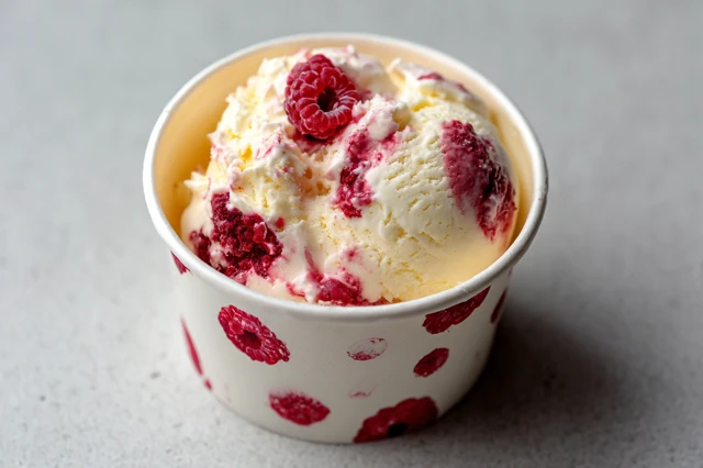 White Chocolate Raspberry Ice Cream Cup Stock Photo