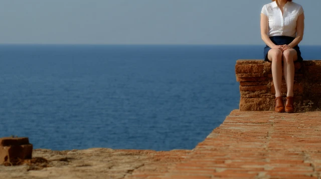 Woman in White by the Sea