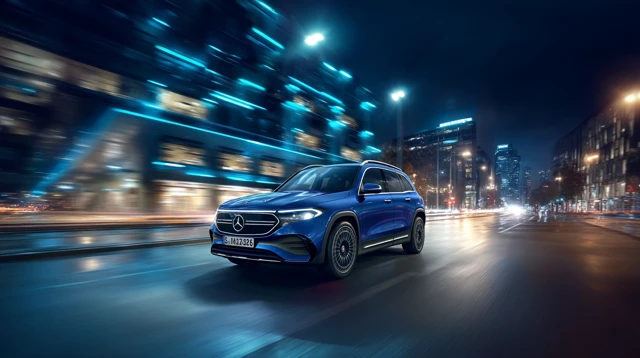 MercedesBenz EQB 260 Driving into a Futuristic City at Night