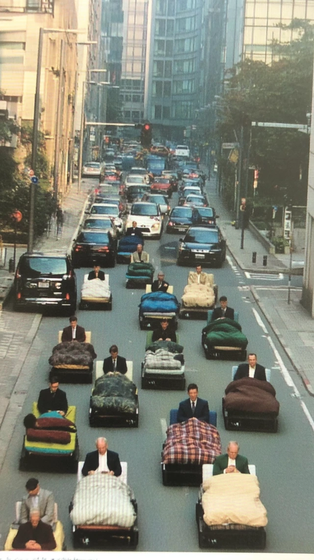 Surreal Commute Beds on City Street