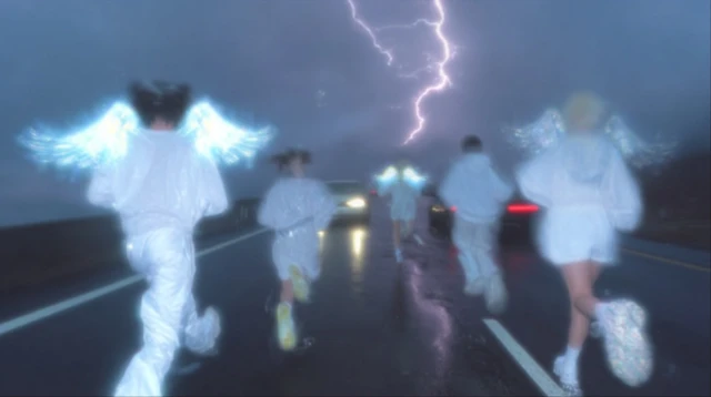 Angels Running on a Rainy Highway at Night