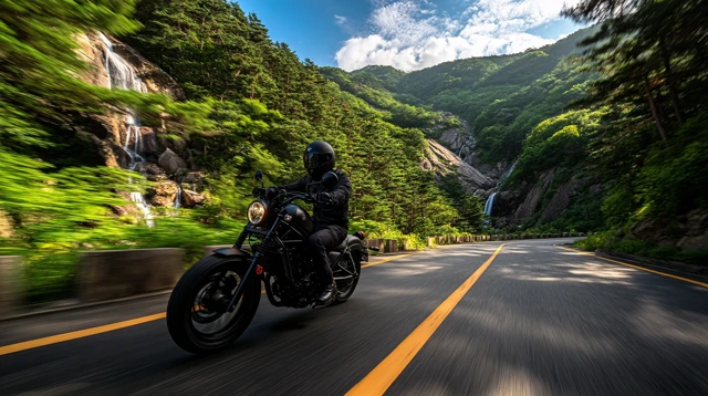 Motorcycle Rider on Mountain Road Korea