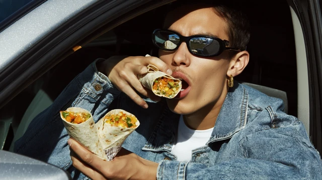 Young Man Eating Burrito in Car Photography