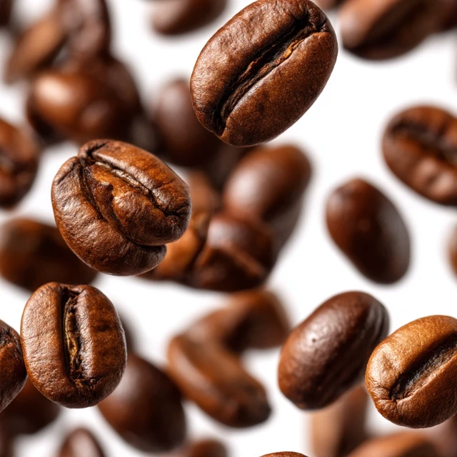 Falling Coffee Beans Isolated on White Background