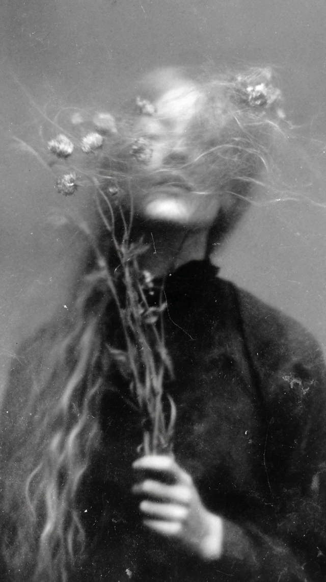 Photo Negative Woman with Flowers