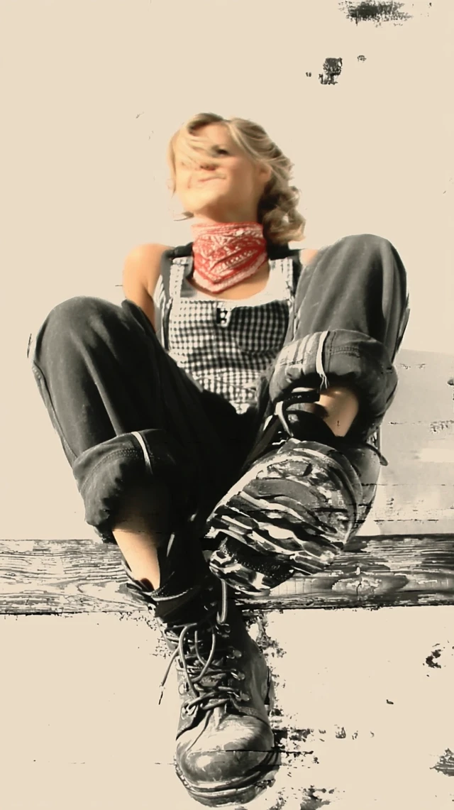 Young Peasant Girl Poses for Camera