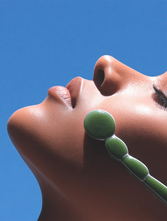 Jade Stone Roller Closeup on Face