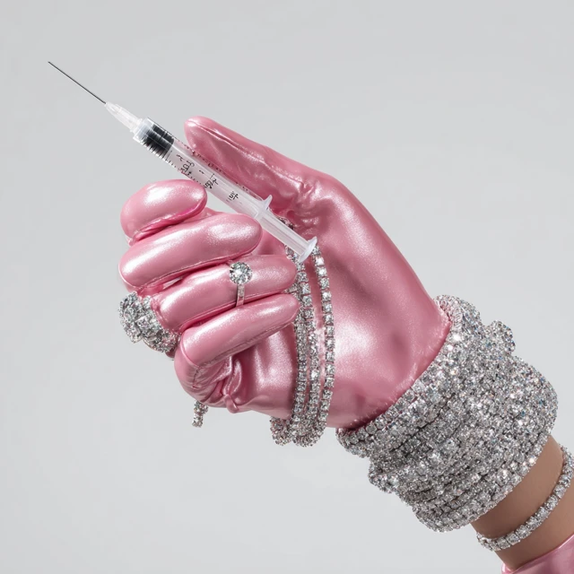 Glamorous Hand Diamonds Syringe Luxury Jewelry Photo