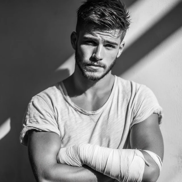 Handsome Brunette Man with Bandaged Arm Portrait