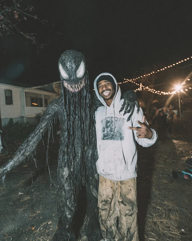 Scary Creature and Human Posing Photo