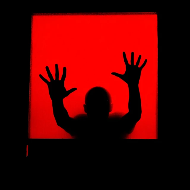 Silhouette Trapped Person Waving Hands