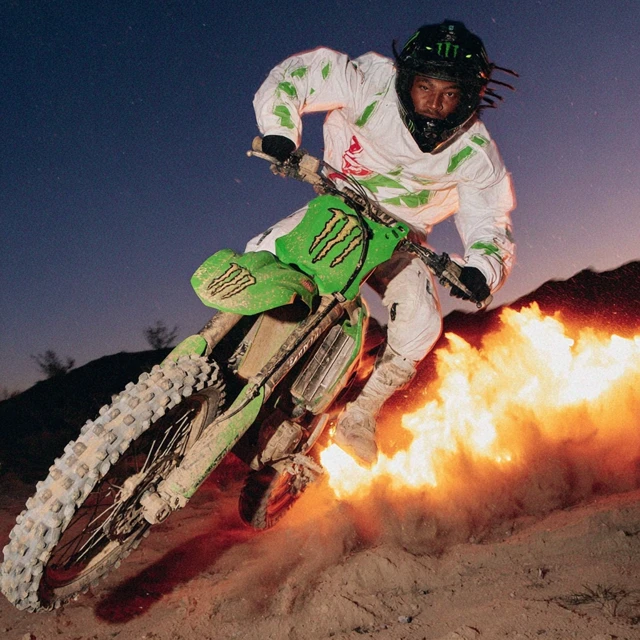 Motocross Rider in Action with Explosive Energy
