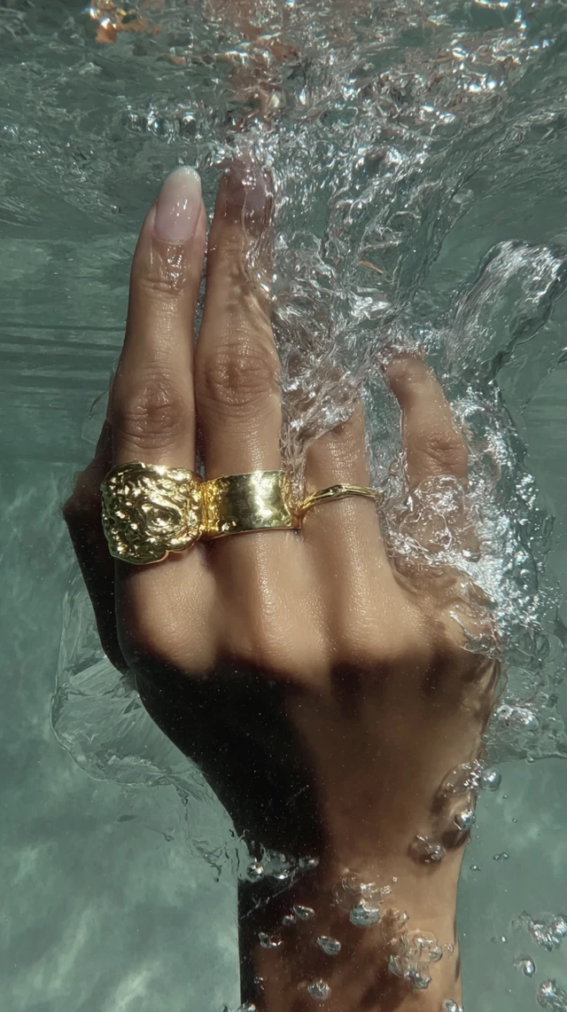 Gold Rings Under Water Luxury Editorial Shot