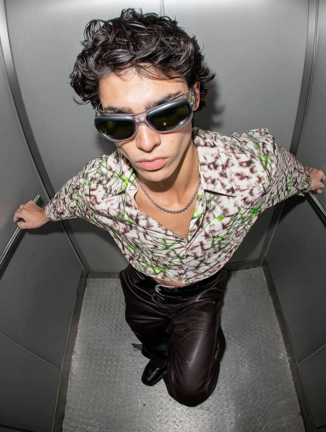 Stylish Man in Elevator Ultra HD Photo