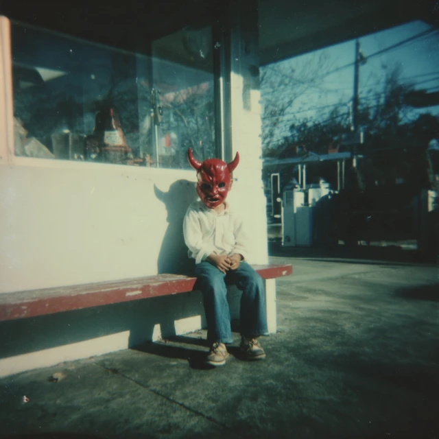 Devil Mask Child at Gas Station Vintage Photo
