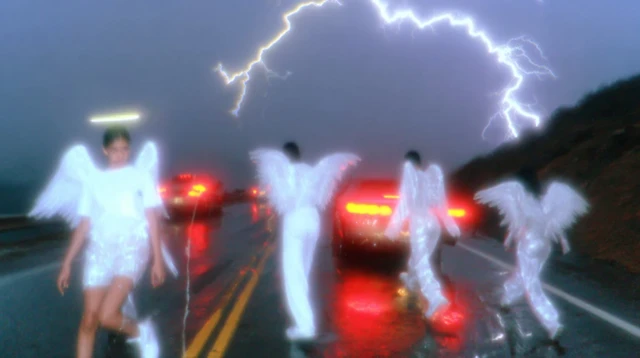 Angels Running on a Rainy Highway at Night